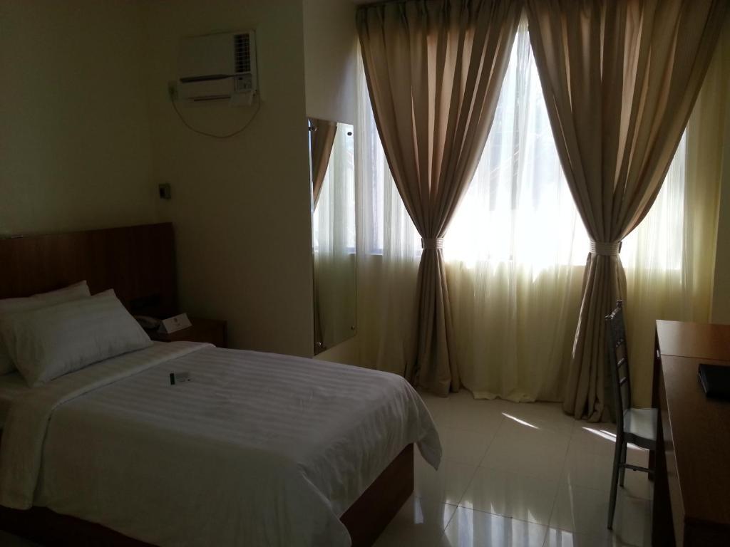 Parkway Hotel Surigao Phòng bức ảnh